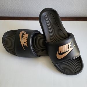 Nike Black Slides with Gold Logo